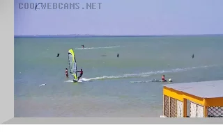 Kitesurfing and windsurfing on the firth of the Fedot Spit in Kirillovka